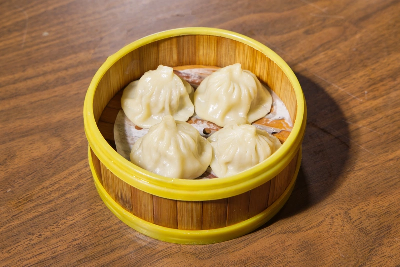 Steamed Soup Dumplings in Bamboo Steamer